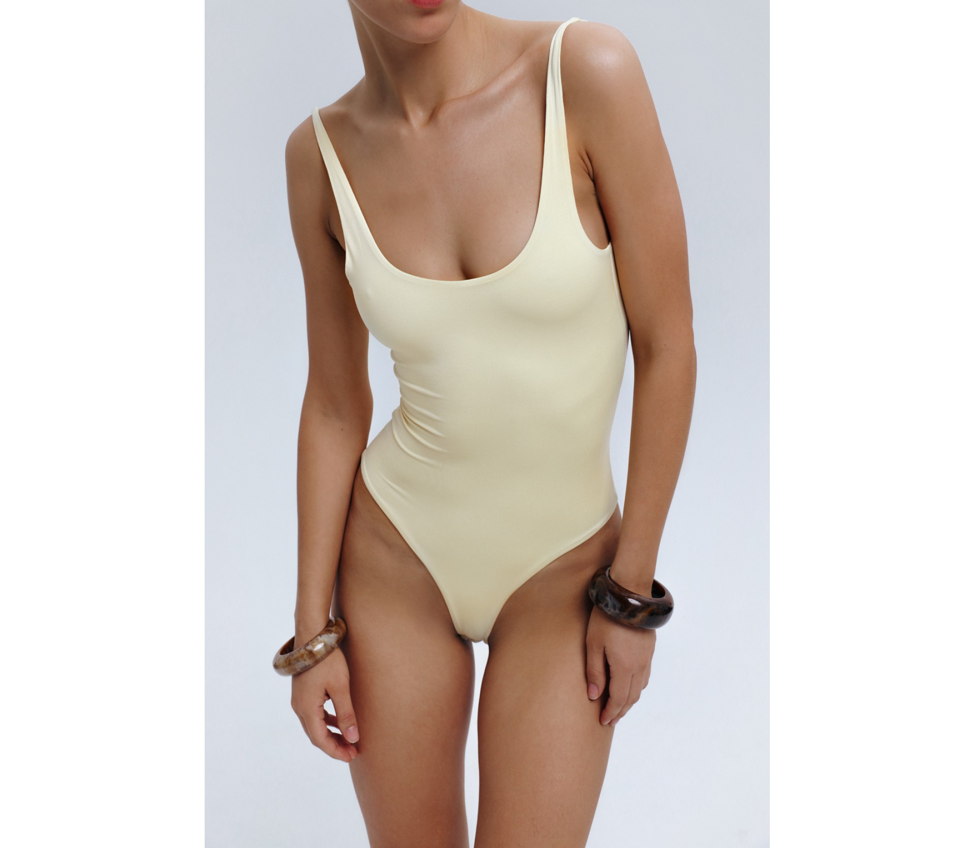 БОДІ З РЕГУЛЬОВАНИМИ БРЕТЕЛЯМИ