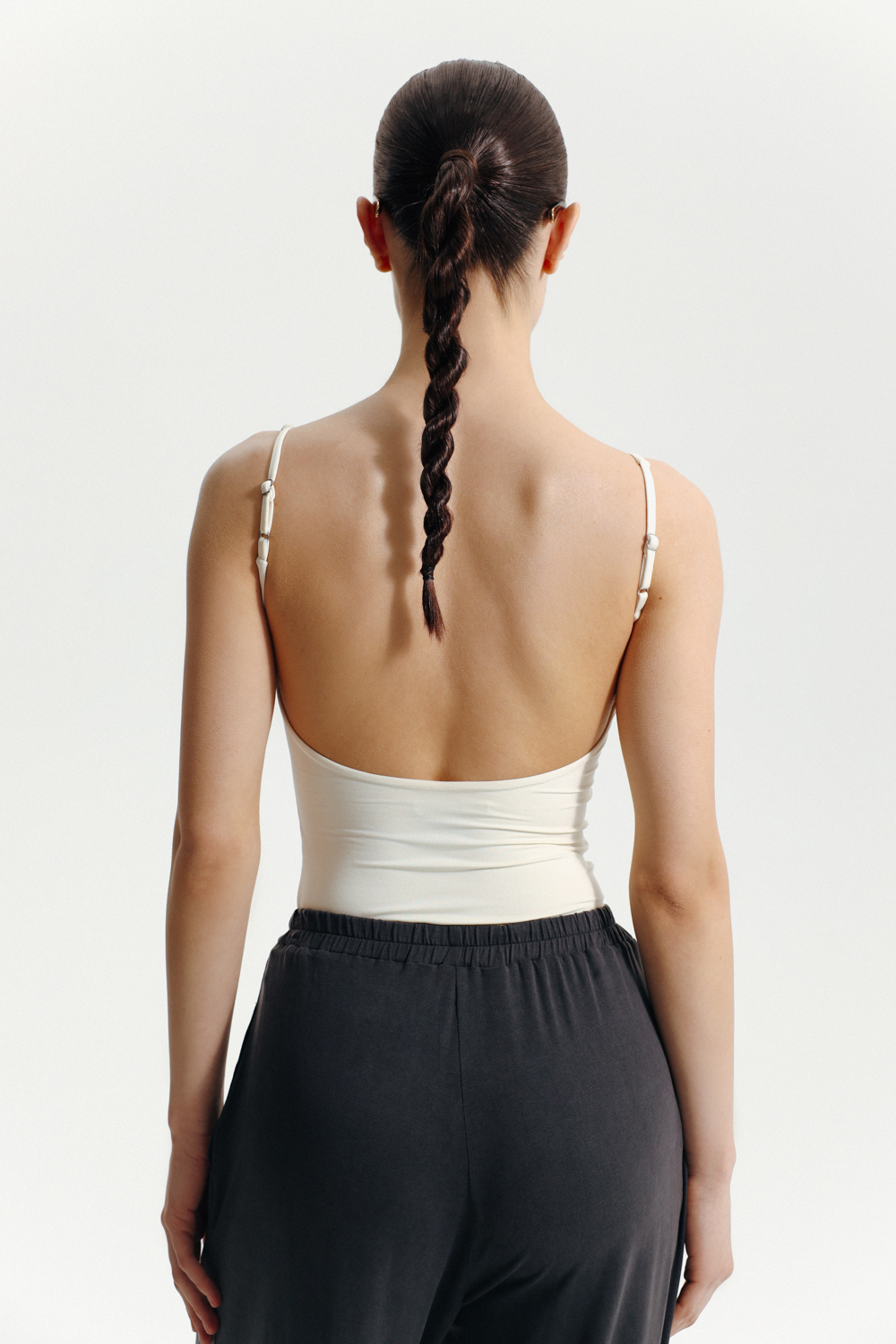 БОДІ З РЕГУЛЬОВАНИМИ БРЕТЕЛЯМИ